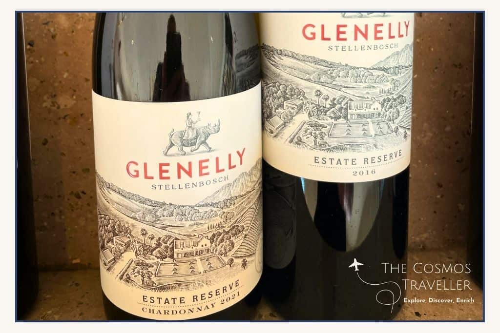 2 red wine bottles, which belong to the Glenelly Winery.