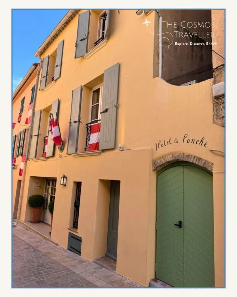 The pastel-coloured entrance of Hôtel La Ponche in Saint-Tropez, tucked in the old town near the sea.
