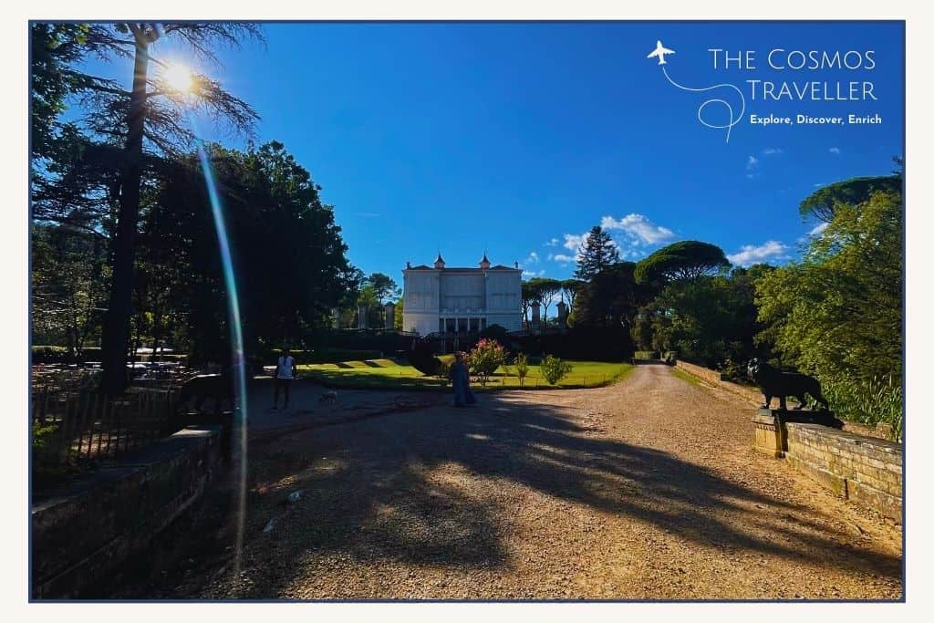 The famous Château d’Astros in Provence on a sunny day, set against a clear blue sky and surrounded by greenery.