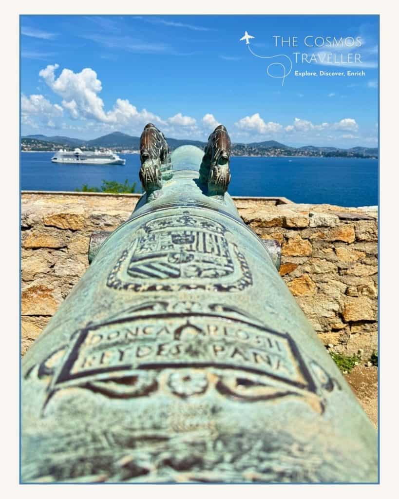 A decorated bronze cannon points out over the Gulf of Saint-Tropez from the Citadel.