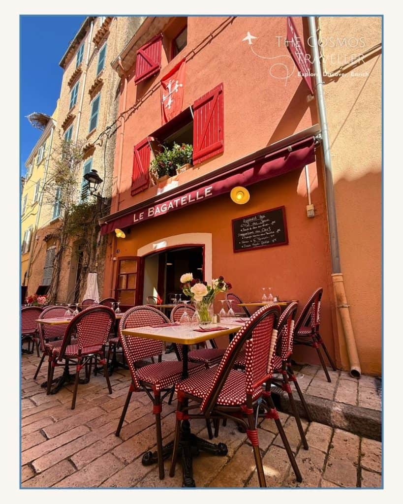 A typical restaurant street scene at La Bagatelle in Saint-Tropez, with lively tables and chic decor.