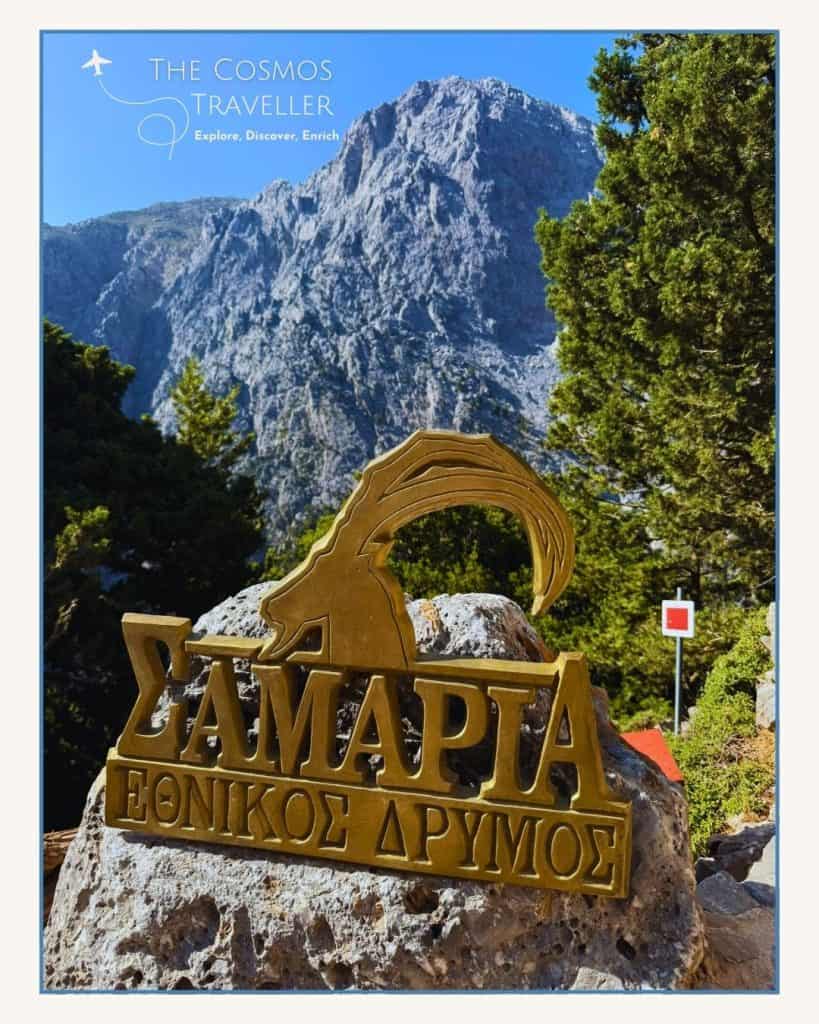 Greek sign with kri-kri goat emblem marking the start of the Samaria Gorge hike.