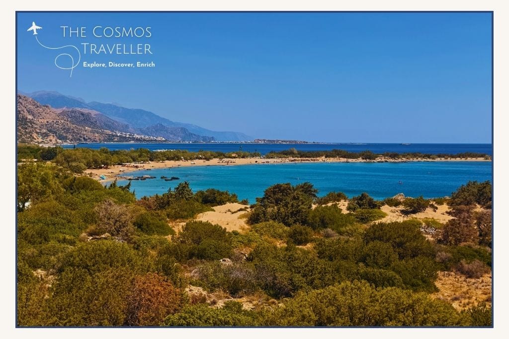 Busy sandy bay at Grammeno Beach near Paleochora, Crete, shallow entry for kids and fully organised loungers.