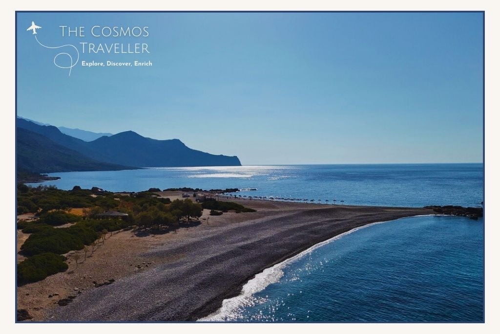 Secluded pebble beach at Pelekanos near Paleochora, Crete, with clear calm water and no facilities.