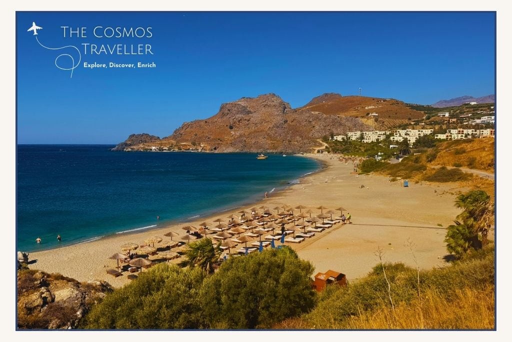 Photo of Damnoni Beach from the eastern road above, showing its wide sandy bay and quieter end near Plakias.