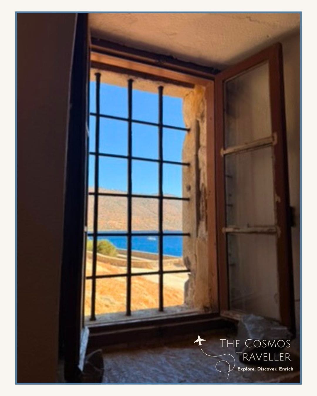 Blue sea seen through the window of the Church of St George on Spinalonga