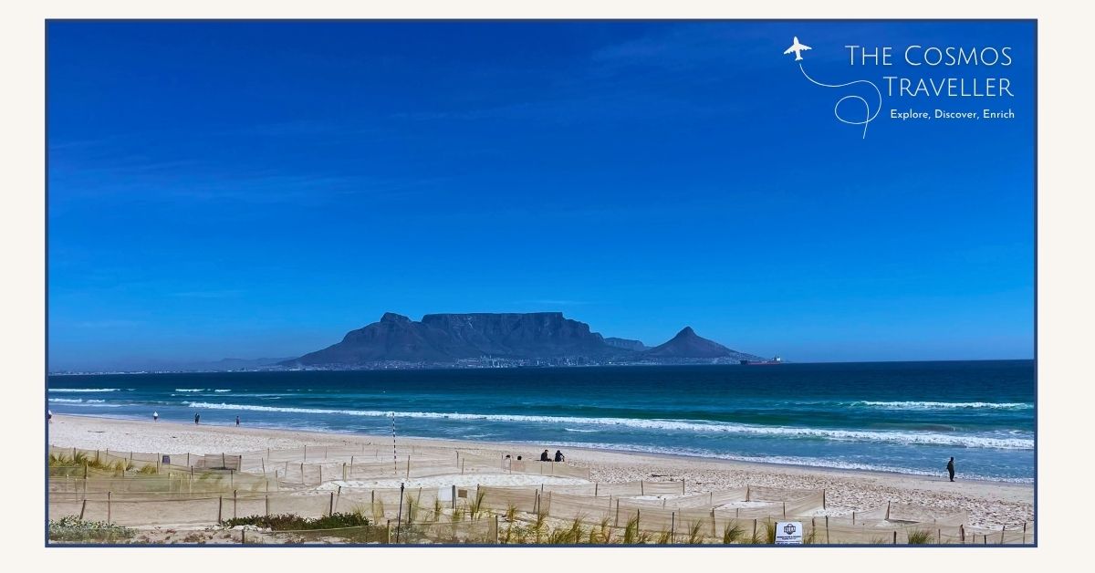 Cape Town Beaches of white sand with Table Mountain in the distance.