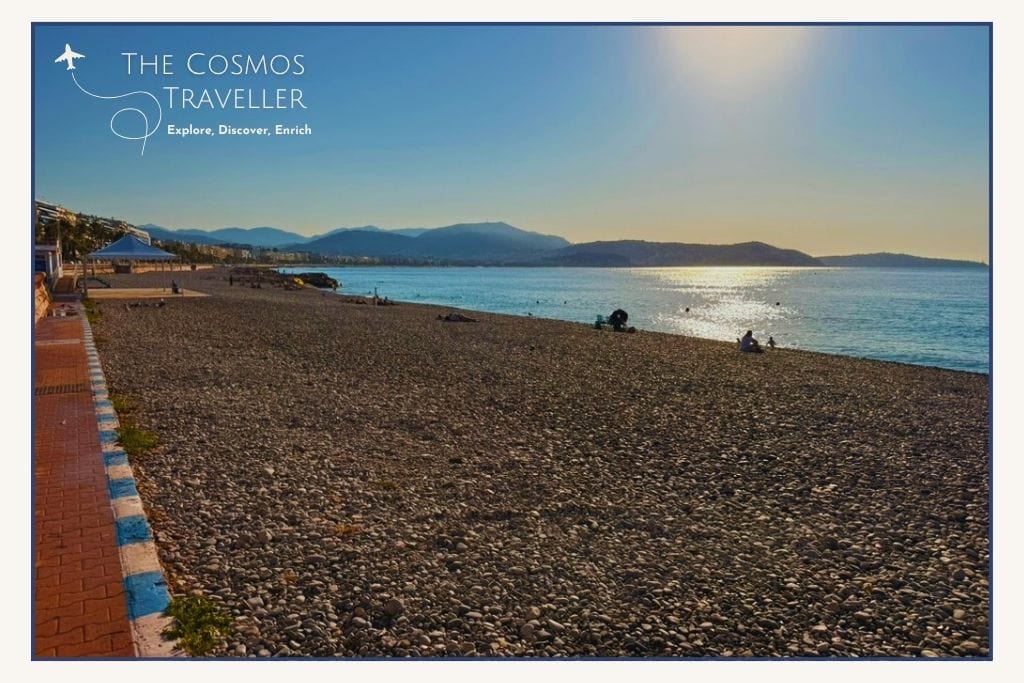 Local atmosphere and pebble beach at Plage du Carras in Nice, France