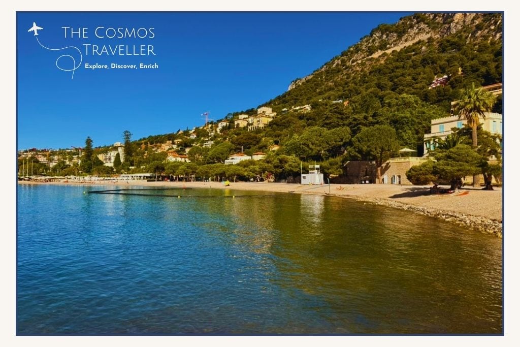 Pine trees and sheltered bay at Plage de la Petite Afrique near Nice