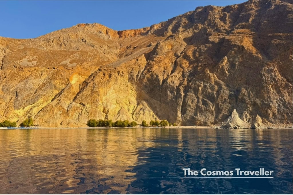 Calm turquoise water in the cove at Glyka Nera (Sweet Water Beach), Crete.