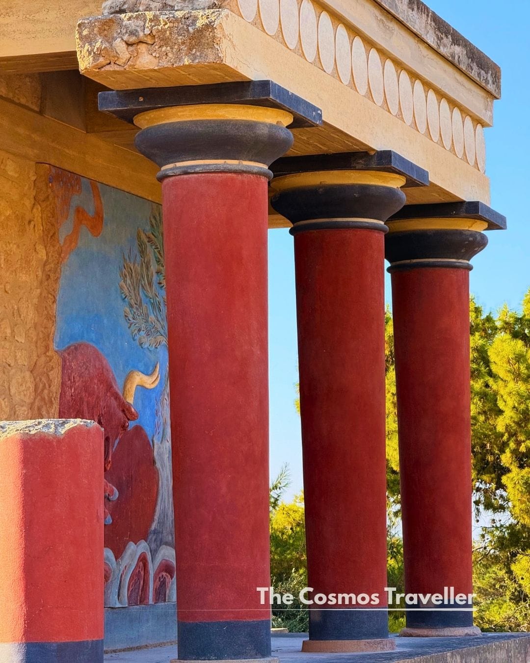 Close-up of the reconstructed red columns and fresco at Knossos