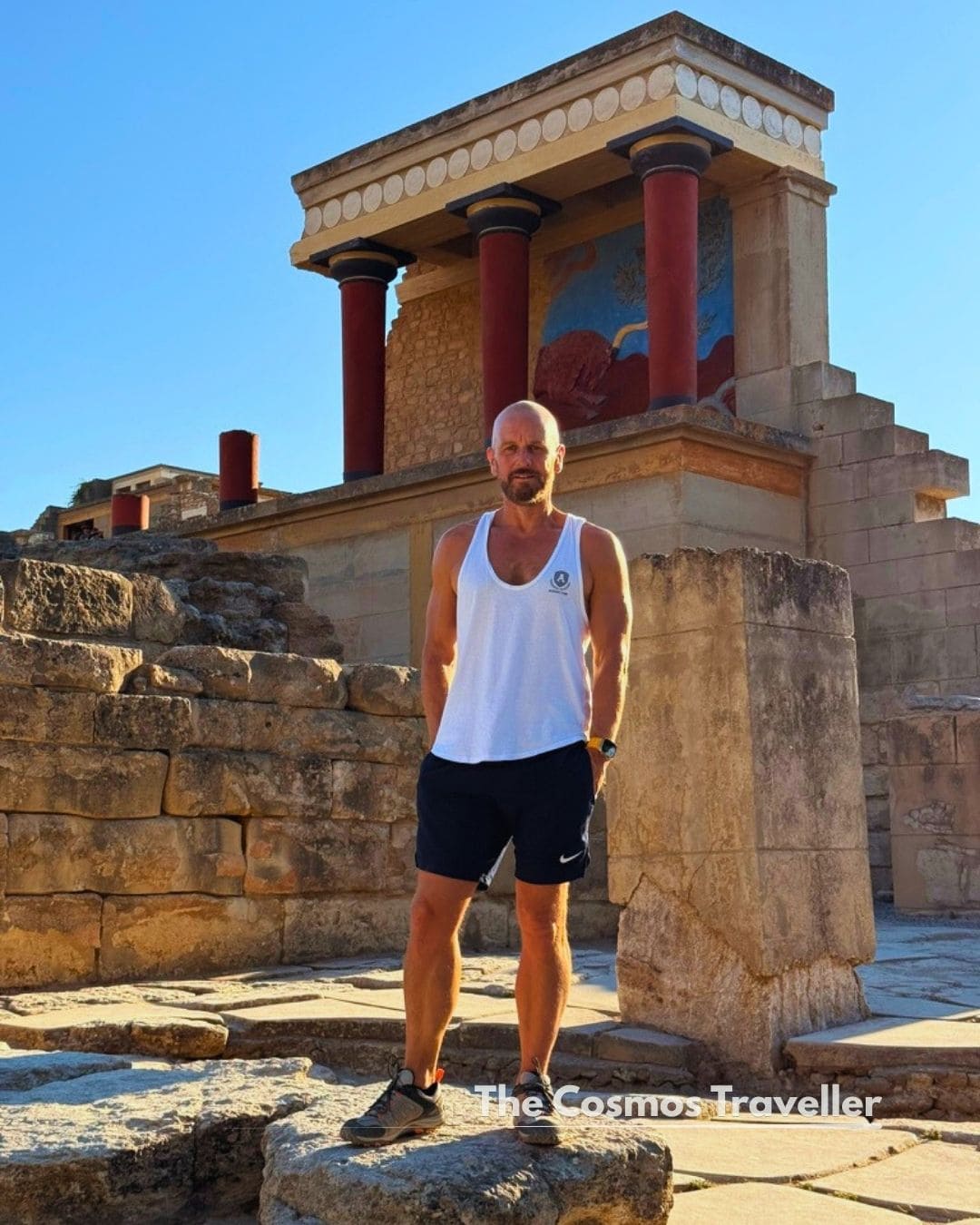 Standing beside the red columns at Knossos Palace