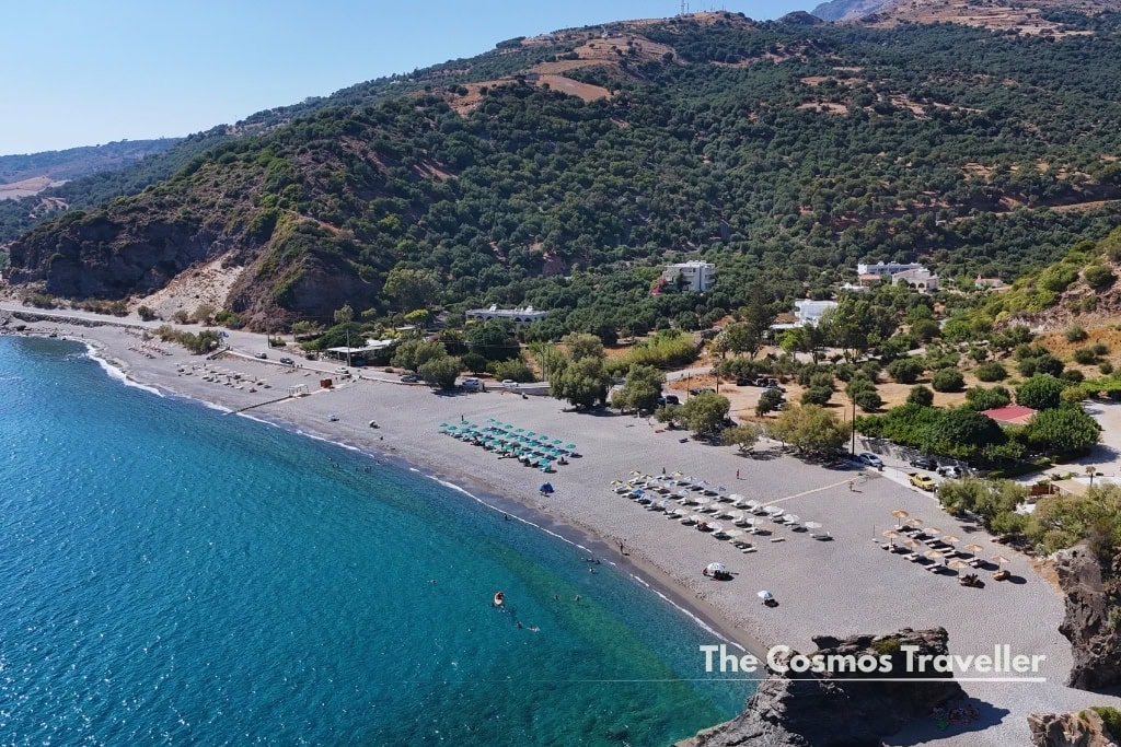 Aerial view of Korakas beach, a family-friendly sandy beach near Rodakino